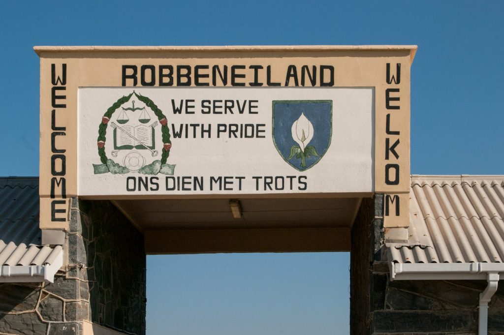 a sign that says bobbenel island we serve with pride on the side of